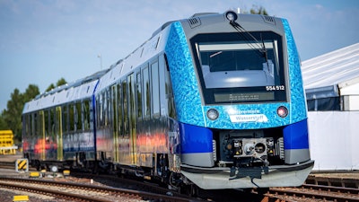 A hydrogen-powered regional train stands at Bremervoerde station, Germany, Wednesday, Aug. 24, 2022. In the fight against climate change, 14 hydrogen trains are to replace the current diesel trains. In Bremervoerde, a trial operation with two prototypes ran successfully between fall 2018 and February 2020.