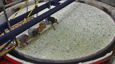 20 tons of Ohara E6 borosilicate glass being loaded onto the mold of one of the GMT’s mirrors.