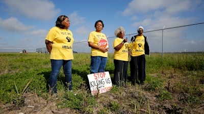 Myrtle Felton, from left, Sharon Lavigne, Gail LeBoeuf and Rita Cooper, members of RISE St. James, conduct a live stream video on property owned by Formosa on March 11, 2020, in St. James Parish, La.