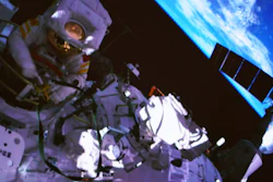 In this photo released by China's Xinhua News Agency, a screen at the Beijing Aerospace Control Center in Beijing shows Chinese astronaut Cai Xuzhe exiting the station lab module Wentian to conduct extravehicular activities, also known as a spacewalk, Saturday, Sept. 17, 2022.