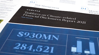 Pages from a Carlyle Group 2021 report on its financial risk from greenhouse gas emissions are photographed Tuesday, Sept. 20, 2022.