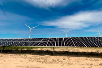 In this image provided by Portland General Electric, windmills and solar panels line a renewable energy facility in Lexington, Ore., on this May 24, 2022.