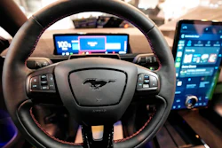 The cockpit of a Ford Mustang Mach-E electric car is pictured at the Motor Show in Essen, Germany, Thursday, Dec. 2, 2021