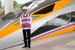 Indonesian President Joko Widodo stands near a newly-unveiled Comprehensive Inspection Train (CIT) unit during his visit at the Jakarta-Bandung Fast Railway station in Tegalluar, West Java, Indonesia, Thursday, Oct. 13, 2022.