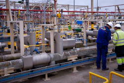 Operators work at Enagas regasification plant, the largest LNG plant in Europe, in Barcelona, Spain, March 29, 2022. Households and businesses across Europe have been suffering for months from soaring electricity prices, but Iberian countries Spain and Portugal have managed to free themselves from the EU pricing system and Spain says the benefits are noticeable.