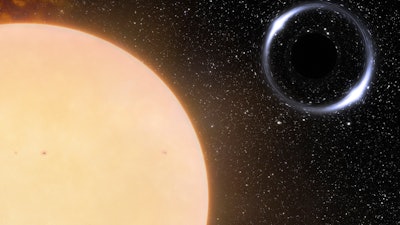 This illustration provided by NOIRLab in November 2022 depicts the closest black hole to Earth and its Sun-like companion star.