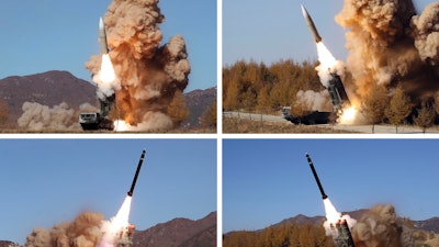 This combination of photos provided by the North Korean government, shows what they say military operation held during Nov. 2-5, 2022, in North Korea. Independent journalists were not given access to cover the event depicted in this image distributed by the North Korean government. The content of this image is as provided and cannot be independently verified.