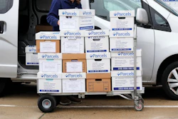 Document boxes with names including Elon Musk and James Murdoch printed on them are taken into the Leonard L. Williams Justice Center in Wilmington, Del., Wednesday, Nov. 16, 2022.
