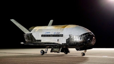 The Boeing-built X-37B Orbital Test Vehicle (OTV) is shown at NASA’s Kennedy Space Center in Florida on Saturday, Nov. 12, 2022. The unmanned U.S. military space plane landed early Saturday after spending a record 908 days in orbit for its sixth mission and conducting science experiments. The solar-powered vehicle, which looks like a miniature space shuttle, landed at NASA’s Kennedy Space Center. Its previous mission lasted 780 days.