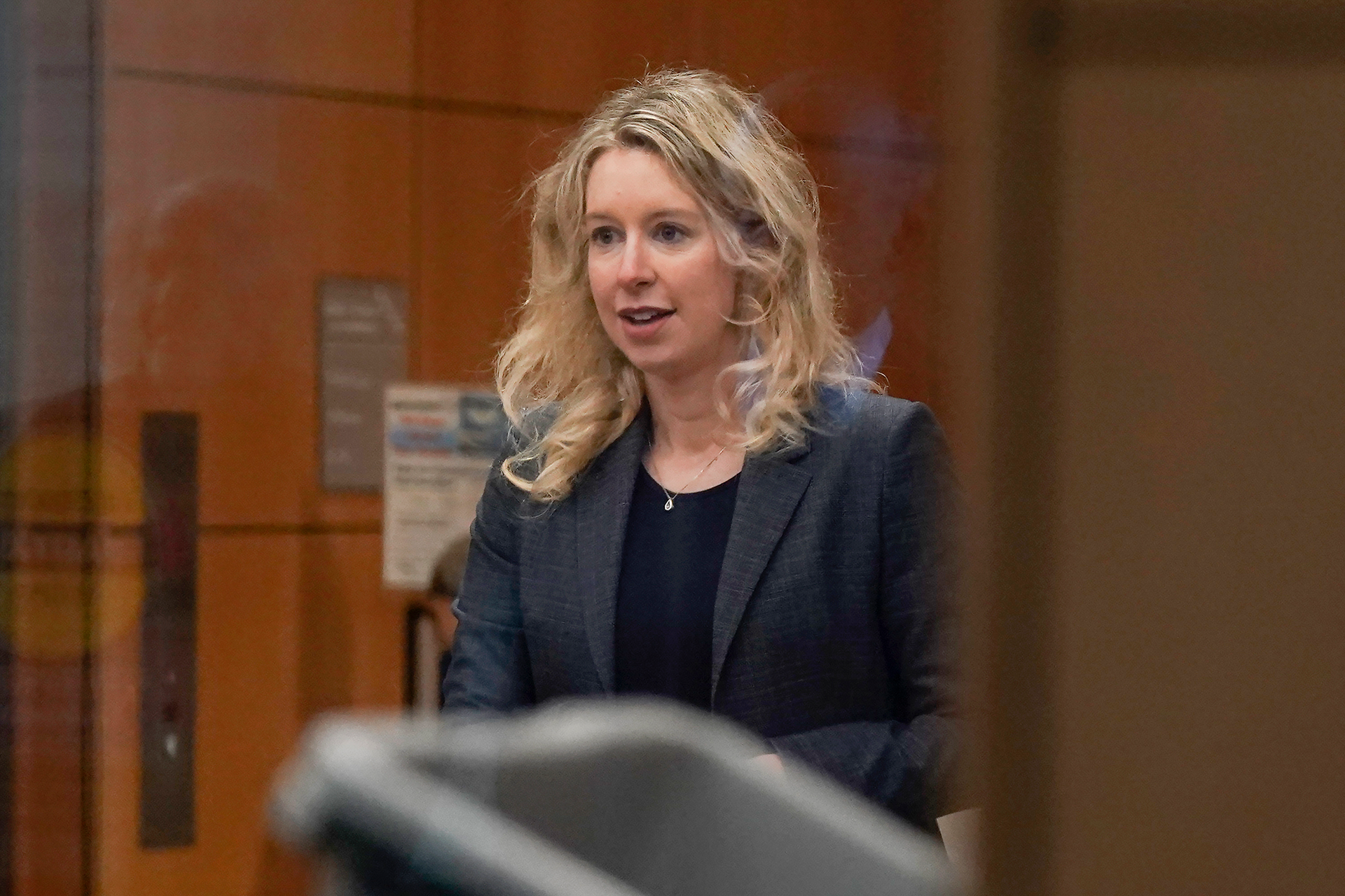 Former Theranos CEO Elizabeth Holmes arrives at federal court in San Jose, Calif., on Oct. 17, 2022.