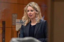 Former Theranos CEO Elizabeth Holmes arrives at federal court in San Jose, Calif., on Oct. 17, 2022.