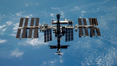 This undated handout photo released by Roscosmos State Space Corporation shows the International Space Station (ISS) during its fly.