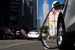 An electric vehicle is plugged into a charger in Los Angeles, on Aug. 25, 2022. People who want to buy an electric vehicle could get a bigger-than-expected tax credit come Jan. 1, 2023, because of a delay by the Treasury Department in drawing up rules for the tax breaks.