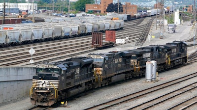 Norfolk Southern locomotives are moved in the in the Conway Terminal in Conway, Pa., Sept. 15, 2022. Major railroads now face pressure from investors to add sick time for workers after Congress declined to require them to do so as part of the contracts they imposed last week to avert a potentially devastating nationwide rail strike. The Interfaith Center on Corporate Responsibility said Monday, Dec. 5, that two investment managers it works with to help promote social change at companies had filed proposals at Union Pacific and Norfolk Southern railroads that will allow shareholders to vote on whether rail workers should get paid sick leave.