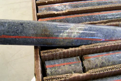 In this Oct. 4, 2011, file photo, a core sample drilled from underground rock near Ely, Minn., shows a band of shiny minerals containing copper, nickel and precious metals, center, that Twin Metals Minnesota LLC, hopes to mine near the Boundary Waters Canoe Area Wilderness in northeastern Minnesota.
