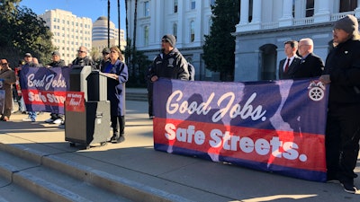 California Assembly member Cecilia Aguiar-Curry, a Democrat from Winters, California, speaks during a rally at the California Capitol on Monday, Jan. 30, 2023, in Sacramento, Calif. Aguiar-Curry has introduced a bill that would require human drivers to be present for self-driving semitrucks.