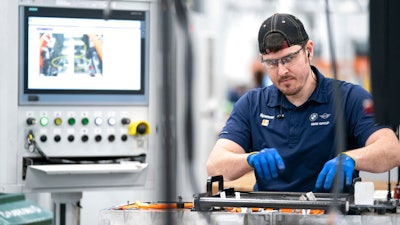 An employee works in the battery assembly hall at the BMW Spartanburg plant in Greer, S.C., Wednesday, October 19, 2022. On Thursday, the Commerce Department issues its first of three estimates of how the U.S. economy performed in the fourth quarter of 2022.