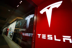 The Tesla logo is seen at the company's store in Denver's Cherry Creek Mall on Feb. 9, 2019. Shares of Tesla tumbled Tuesday, Jan. 3, 2023, on the first full day of trading since the company announced 2022 delivery numbers that fell short of targets.