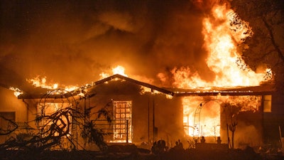 A house burns on Platina Road at the Zogg Fire near Ono, Calif., on Sept. 27, 2020.