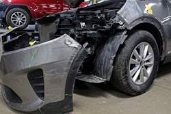 A Kia which was damaged after being stolen is seen at an auto repair shop in Milwaukee on Wednesday, Jan. 27, 2021.