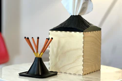 A volcano-themed tissue box designed with the help of AI-assisted image generation.