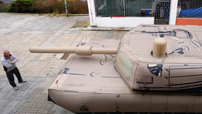 An inflatable decoy of an Abrams tank is presented to media in Decin, Czech Republic, Monday, March 6, 2023.