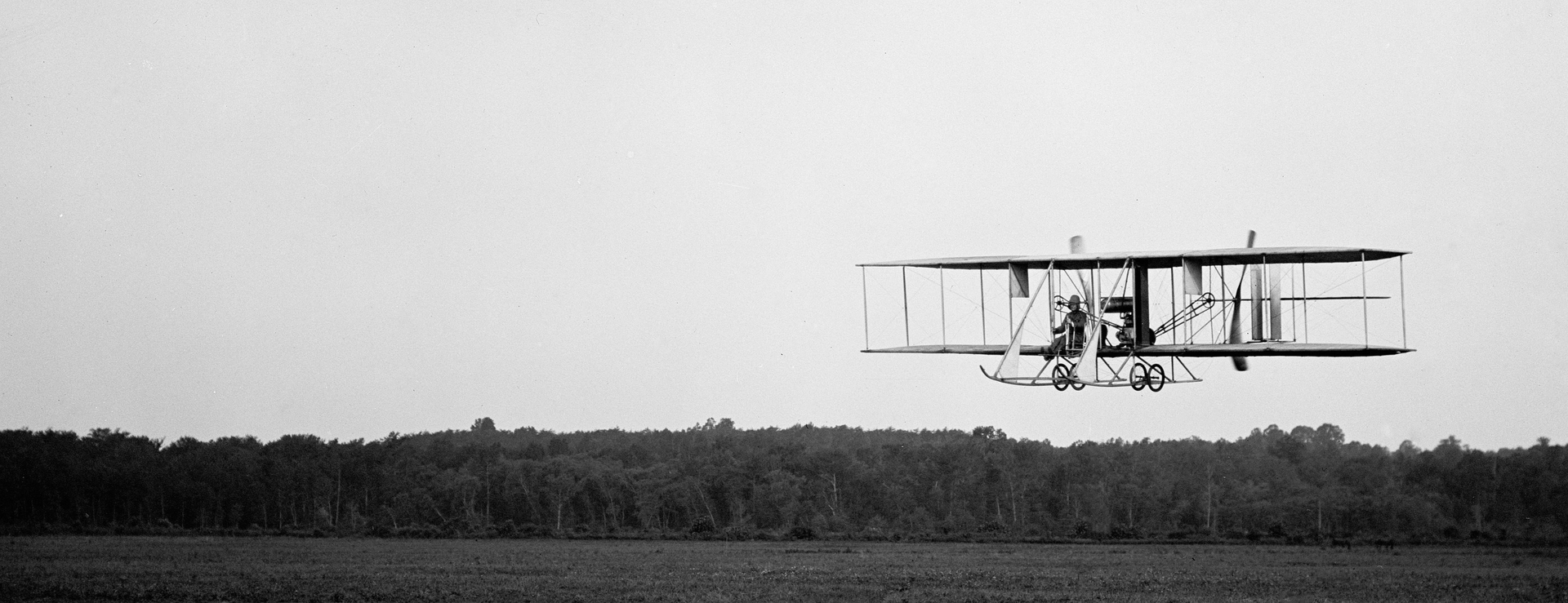 The Wright Brothers airplane being tested. Their plane was the first Military Plane Purchased by US. Biplane circa 1910.