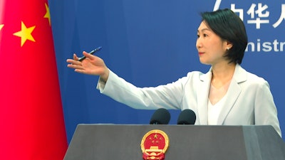 Chinese Foreign Ministry spokesperson Mao Ning gestures during a press conference at the Ministry of Foreign Affairs in Beijing, Wednesday, May 24, 2023.