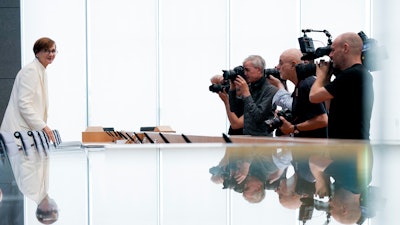 Germany's Science Minister Bettina Stark-Watzinger, left, arrives for a news conference to present the government's new strategy for supporting research into nuclear fusion, a technology some hope will some day provide almost unlimited, clean energy, in Berlin, Germany, Thursday, June 22, 2023.