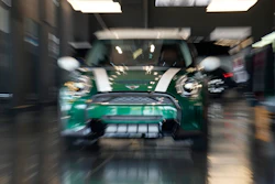 An unsold 2024 Cooper S hardtop sits in a Mini dealership Friday, July 21, 2023, in Highlands Ranch, Colo.