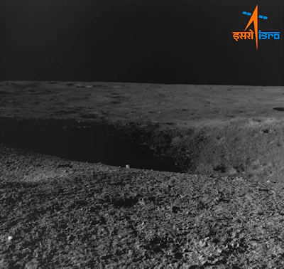 This image provided by the Indian Space Research Organisation shows a crater encountered by Chandrayaan- 3 as seen by the navigation camera on Aug. 27, 2023.