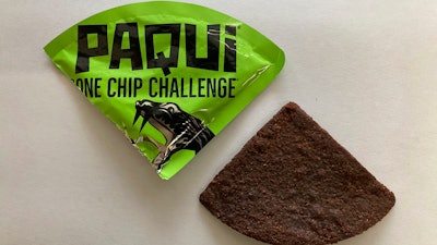 A Paqui One Chip Challenge chip is displayed in Boston, Friday, Sept. 8, 2023.