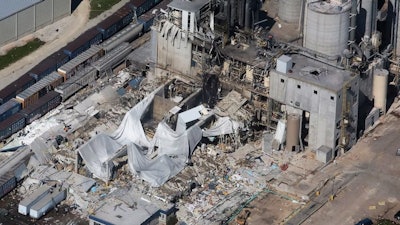 In this June 1, 2017 file photo, part of the Didion Milling Plant lies in ruins following a May 31, 2017, explosion in Cambria, Wis.