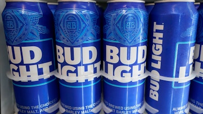 Cans of Bud Light chill in a refrigerator in Oakland, Calif., Friday, April 28, 2023.