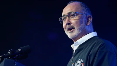 United Auto Workers president Shawn Fain speaks before President Joe Biden at an event with UAW autoworkers at the Community Building Complex of Boone County, Thursday, Nov. 9, 2023, in Belvidere, Ill.