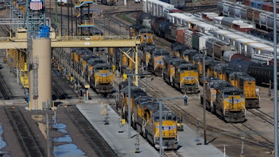 Locomotives stacked with freight cars at the Union Pacific Railroad's Bailey Yard, North Platte, Neb., April 21, 2016.