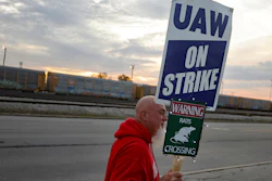 Dan Back, a United Auto Workers Local 12 member, pickets during the ongoing UAW strike at the Stellantis Toledo Assembly Complex on Thursday, Oct. 26, 2023, in Toledo, Ohio. Members of the United Auto Workers union moved closer to approving a contract agreement with Stellantis on Friday, Nov. 17, as two large factories in Detroit voted overwhelmingly for the deal.