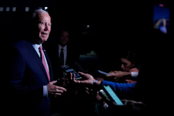 President Joe Biden speaks to members of the media before boarding Air Force One in Norfolk, Va., Nov. 19, 2023.