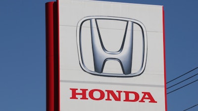 The logo of Honda Motor Co., is seen in Yokohama, near Tokyo on Dec. 15, 2021.