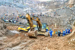 Excavators and people surround the scene of the miners rescue operation on Sunday, Dec. 3, 2023 in Chingola, around 400 kilometers (248 miles) north of the capital Lusaka, Zambia.