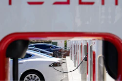 Tesla vehicles charge at a station in Emeryville, Calif., Aug. 10, 2022.