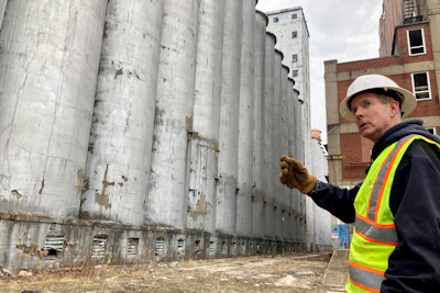Chris Richmond, president of Moving Pillsbury Forward, the nonprofit formed to demolish and redevelop the former Pillsbury Mills plant in Springfield, Ill., discusses the 160 separate, 100-foot-tall silos that must be razed, Dec. 30, 2022.