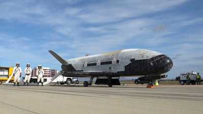 This undated photo provided by the U.S. Air Force shows an X-37B Orbital Test Vehicle at NASA's Kennedy Space Center in Florida.