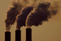 Emissions rise from the smokestacks at the Jeffrey Energy Center coal power plant as the sun sets, near Emmett, Kan., Sept. 18, 2021. The Supreme Court will hear arguments in February on whether the Environmental Protection Agency can continue enforcing its anti-air-pollution “good neighbor” rule in 10 states, an effort to restrict smokestack emissions from power plants and other industrial sources that burden downwind areas with smog-causing pollution.
