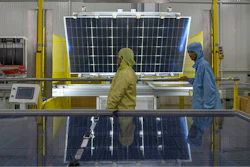 Employees work at the Adani New Industries Limited, one of India's largest solar panels and wafers manufacturing facility in the port town of Mundra in Western India's Gujarat state, India, Wednesday, Sept. 20, 2023.