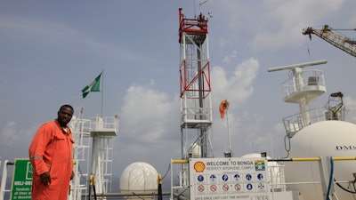 A member of Shell staff on the Bonga offshore oil Floating Production Storage and Offloading vessel off the coast of the Niger Delta in Nigeria, Monday, Dec. 26, 2011.