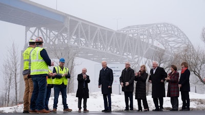 President Biden speaks with iron workers and others near the John A. Blatnik Bridge between Duluth, Minn., and Superior, Wis., Jan. 25, 2024.