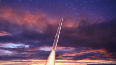 A rendering of the new LGM-35 Sentinel missile flying at twilight.