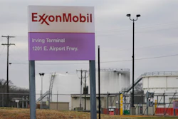 A sign marks the entrance to an ExxonMobil fuel storage and distribution facility in Irving, Texas, Jan. 25, 2023.