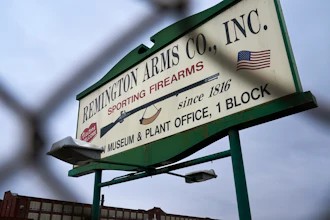 A sign for Remington Arms Co. is displayed in front of their compound in Ilion, N.Y., Thursday, Feb. 1, 2024. The nation’s oldest gun-maker is consolidating operations in Georgia and recently announced plans to shutter the Ilion factory in early March.